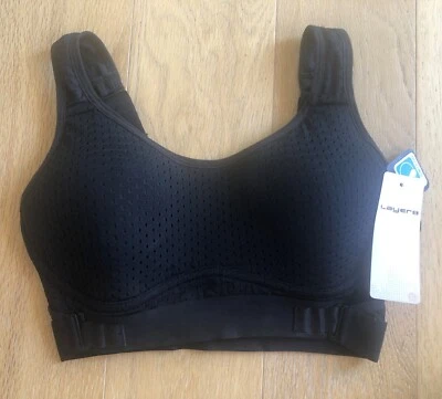 SUJETADOR DEPORTIVO NEGRO CAPA 8 TAZAS MOLDEADAS BANDA/CORREAS AJUSTABLES 32B A 36AA $40 Foto 1 de 4