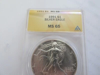 1991 Silver Eagle , ANACS , MS 65 , $1 - Image 1 of 4