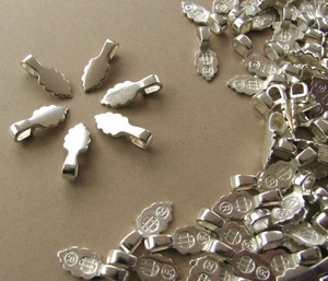 184 Stück versilberte kleine Blattbügel zum Aufkleben ca. 7 x 17 mm - Bild 1 von 7