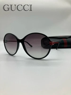 Gafas de sol redondas de gran tamaño Gucci GG 3138S marco negro brazos de metal rojo MFJN3 Italia Foto 1 de 4