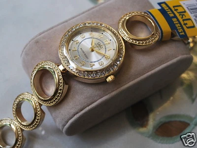 Nice New Q&Q by Citizen Gold Tone Lady Dress Watch w/Diamond Bezel - Image 1 of 4