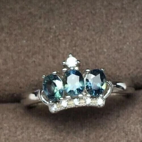 Anillo de boda de lujo con corona de topacio azul de Londres simulado ovalado enchapado en oro blanco de 14 k Foto 1 de 4