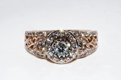 Anillo de compromiso con halo de diamantes de corte redondo natural de 1,28 quilates de oro rosa de 14 quilates de $5.000 Foto 1 de 4