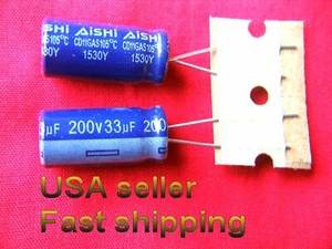4 pc  -  33uf 200v  radial  electrolytic capacitors 105c (blu)  - Picture 1 of 2