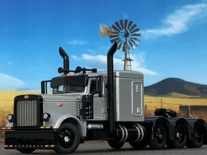 1/64 DCP SILVER PETERBILT 389 TRI AXLE W/ 63" FLAT TOP SLEEPER - Picture 1 of 6