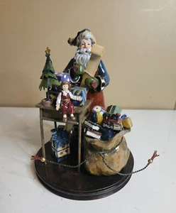 Weihnachtsmann Werkstatt Figur Weihnachtsmann Halteliste mit Spielzeugtasche und Werkbank Spielzeug - Bild 1 von 9