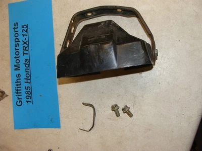 HONDA TRX125 FOURTRAX 1986 84-86 OEM faro canastilla soporte soporte Foto 1 de 4