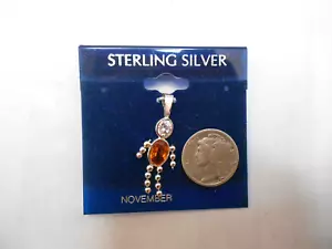{ STERLING SILVER STICK BOY FIGURE ORANGE STONE NECKLACE PENDANT - Picture 1 of 2