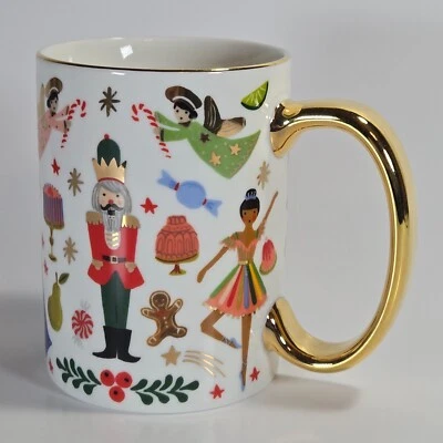 Caneca de Natal quebra-nozes papel rifle Anthropologie porcelana cabo dourado 4 3/8" - Imagem 1 de 4