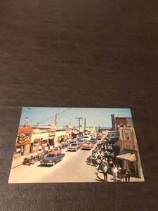 UNPOSTED POSTCARD - MOTORCYCLISTS - A.M.A. RACES - DAYTONA BEACH, FLORIDA - Picture 1 of 2