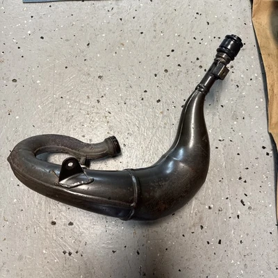 CABEZAL TUBO ESCAPE KX65 ORIGINAL OEM KAWASAKI RM KX 65 (2002-2022) Foto 1 de 4