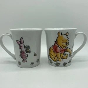 2er Set neue Disney Winnie Puuh Ferkel Gänseblümchenkette Keramikbecher - Bild 1 von 6
