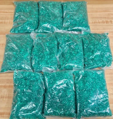 Lot of ~50,000 Transparent Green 6mm Faceted Rondelle Spacer Plastic Craft Beads - Image 1 of 4