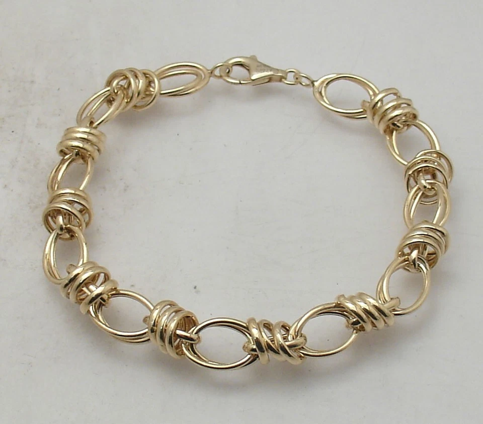 Brazalete Technibond Multi Ovalado Rolo Link Chapado en Oro Amarillo 14K Plata 8.25" Foto 1 de 4