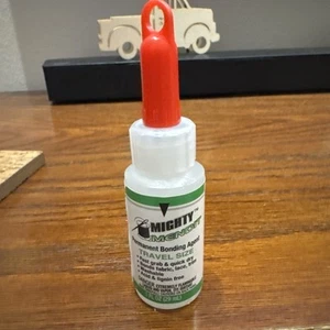 Mighty MENDIT Permanent Fabric Adhesive, Flexible Stretchable Washable Clear 1oz - Picture 1 of 2