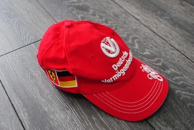 FERRARI F1 DEUTSCHE VERMOGENSBERATUNG SCHUMACHER RED CAP 2006 GERMANY ITALY FLAG - Image 1 of 4