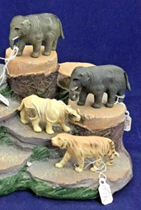 Juego de cuatro animales en miniatura de celuloide vintage de África - Imagen 1 de 3