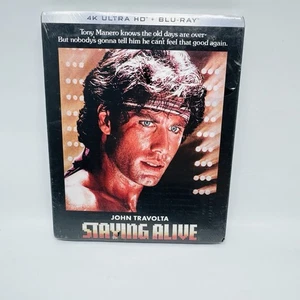 Blu-ray 4K UHD - Staying Alive (+ Blu-ray, with Slip Cover, John Tavolta) New - Foto 1 di 6