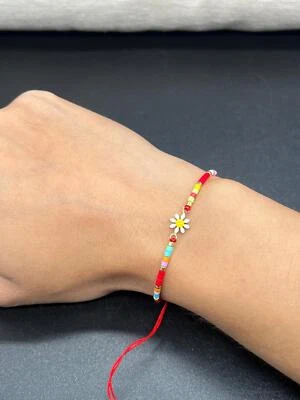 Pulseras de cordón ajustables con cuentas de flores Foto 1 de 4