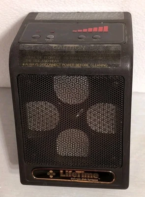 Mini calentador de colección, horno de disco de por vida Del-Rain 1500 W portátil, calor instantáneo WOW Foto 1 de 4