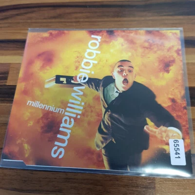 ROBBIE WILLIAMS: Millennium    > VG+/VG+(MCD) - Bild 1 von 2