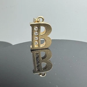 Colgante/dije de oro macizo de 14k/1,69 gramos de peso/8,4 mm de ancho/13 mm de alto - Imagen 1 de 11