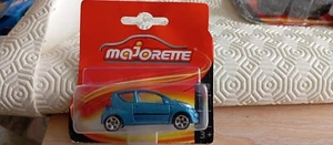 MAJORETTE - CITROEN C1 AZUL BLISTER DEFECTUOSO 1/64 APROX *NUEVO* - Imagen 1 de 5