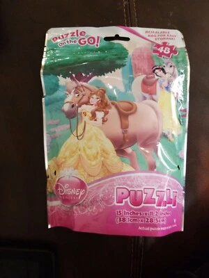 Rompecabezas de princesas Disney sobre la marcha Ariel Bella y Blancanieves 48 piezas Foto 1 de 3