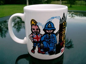 LONDON SOUVENIR COFFEE MUG WITH BRIDGE AND LONDON CHARACTERS NICE ONE - Picture 1 of 7