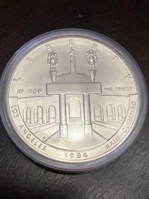 1984-P Olympic Unc Silver Dollar US Mint Commemorative $1 Capsule Only BU - Image 1 of 2