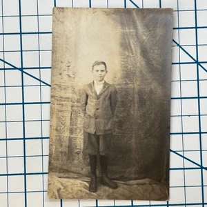 RPPC Antique Sepia Real Photo Postcard Boy in Vintage Attire Early 1900s - Picture 1 of 3