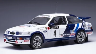MODELLINO AUTO STATICO IXO FORD SIERRA #4 1000 LAKES RALLY 1988 SCALA 1/24 - Immagine 1 di 4