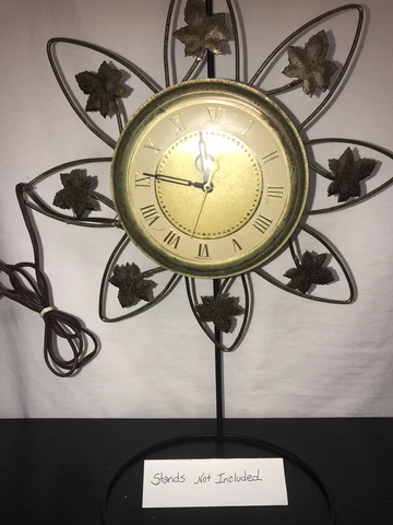 vintage united wall clock electric model no.55 works gold color maple leafs Cover