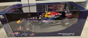 RED BULL RB9 MARK WEBBER FINAL GRAND PRIX BRAZILIAN GP 2013, 1/18, MINICHAMPS - Bild 1 von 3