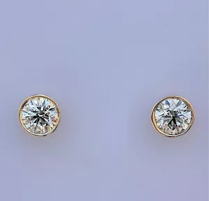 0.65 CARAT G VS1 DIAMOND STUD BEZEL SET EARRINGS 14K YELLOW GOLD - Picture 1 of 3