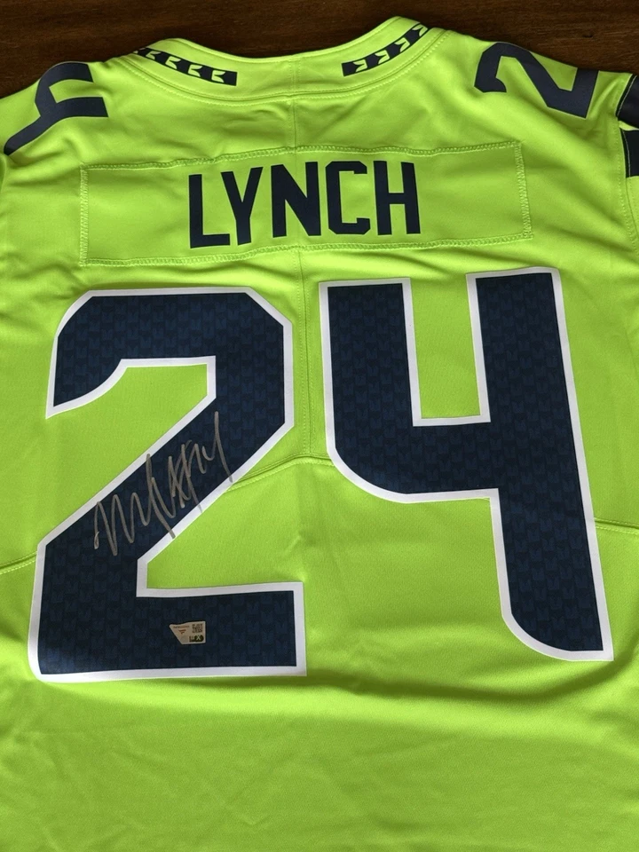 Marshawn Lynch Signed Sea Seahawks Nike Green Limited Jersey NWT & Fanatics COA - Image 1 of 4