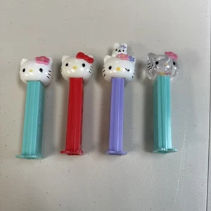 4  Vintage Pez  Hello Kitty  Dispensers Made In Hungary 1 Crystal Skull Pink Bow - Picture 1 of 5