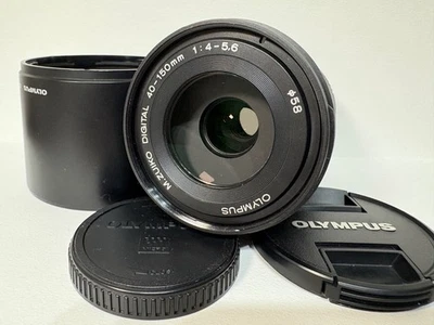 Neuwertiges Olympus M.Zuiko 40-150mm f/4.0-5.6 Zoomobjektiv MicroFourThirds silber #449 - Bild 1 von 4