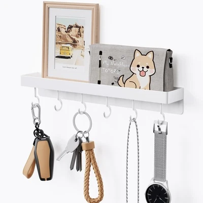 Porta llaves autoadhesivo blanco con ganchos de acero inoxidable para decoración de paredes Foto 1 de 4