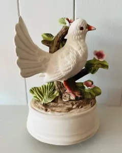 Vintage wind up Revolving Musical Ceramic Figure Ornament of a dove (born free) - Picture 1 of 6
