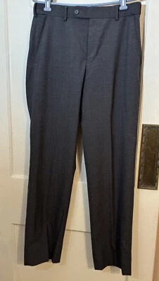 Pantalones de vestir grises Enro para hombre 50 % lana 50 % poliéster 32 W 31 L frente plano negocios Foto 1 de 4