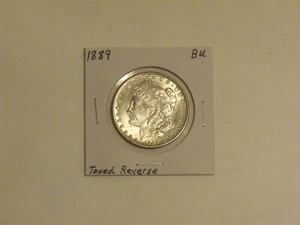 1889  Morgan Silver Dollar    Brilliant Uncirculated  Nice reverse toning - Picture 1 of 2