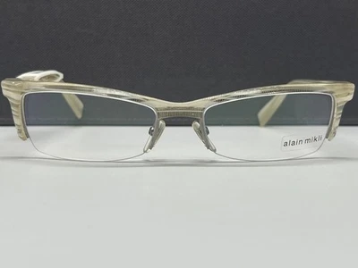 Monturas de gafas Alain Mikli para hombres mujeres plateadas crema cuadradas AL0884 0003 NP: 412 € Foto 1 de 4