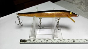 RAPALA, VINTAGE (FINLANDIA) "FLOTADOR", 4", DORADO/NEGRO.BK./VIENTRE BLANCO, GANCHOS/ANILLOS NUEVOS - Imagen 1 de 4