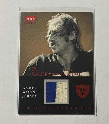 FRED BILETNIKOFF 2004 FLEER GREATS THE GLORY OF THEIR TIME GAME WORN 2-CLR PATCH - Image 1 of 2