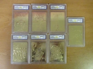 Star Wars 1995 e 1996 Score Board 23 KT Gold Foil Cards set 7 carte GIOCO PERFETTO - MT 10 - Foto 1 di 10