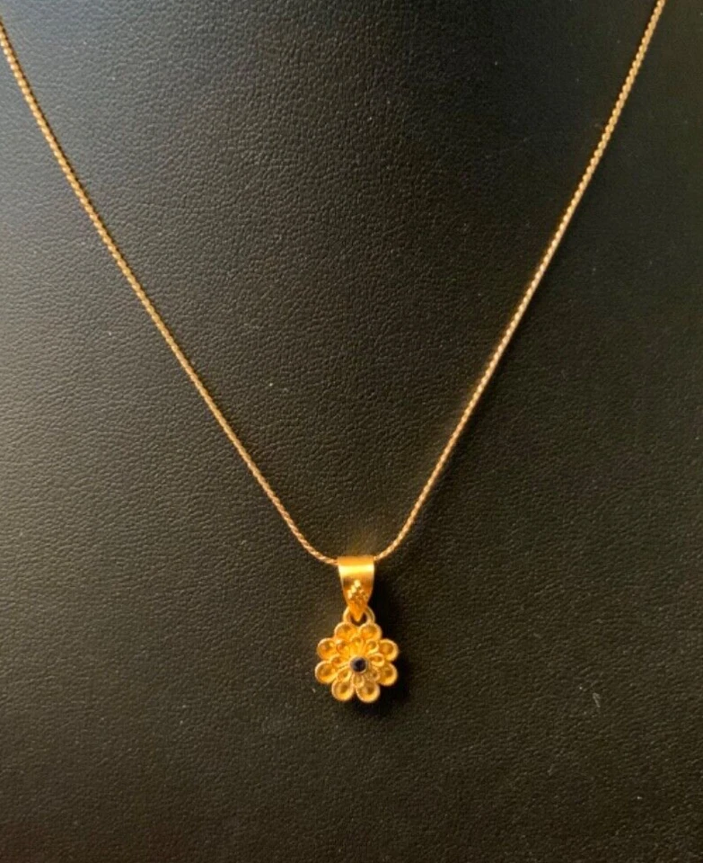 22KT Yellow Gold Flower Shape Pendant With Sapphire Center Stone - Image 1 of 2