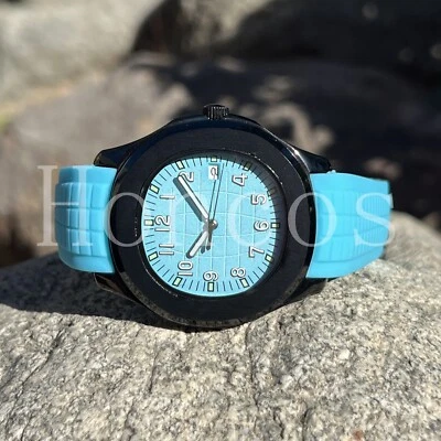 Reloj Estilo PP Personalizado NH35 Movimiento Automático Aquanaut Azul Hielo y Negro Foto 1 de 4