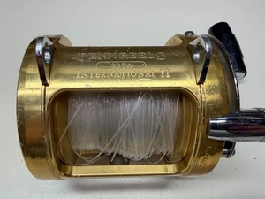 CARRETE PENN CARRETE DE PESCA INTERNATIONAL II 30TW ORO FUNCIONANDO EE. UU. - Imagen 1 de 10