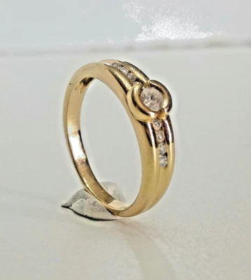 Belle bague femme 9 diamants d'occasion joaillerie or jaune 18 carats doigt 53 - Photo 1/4